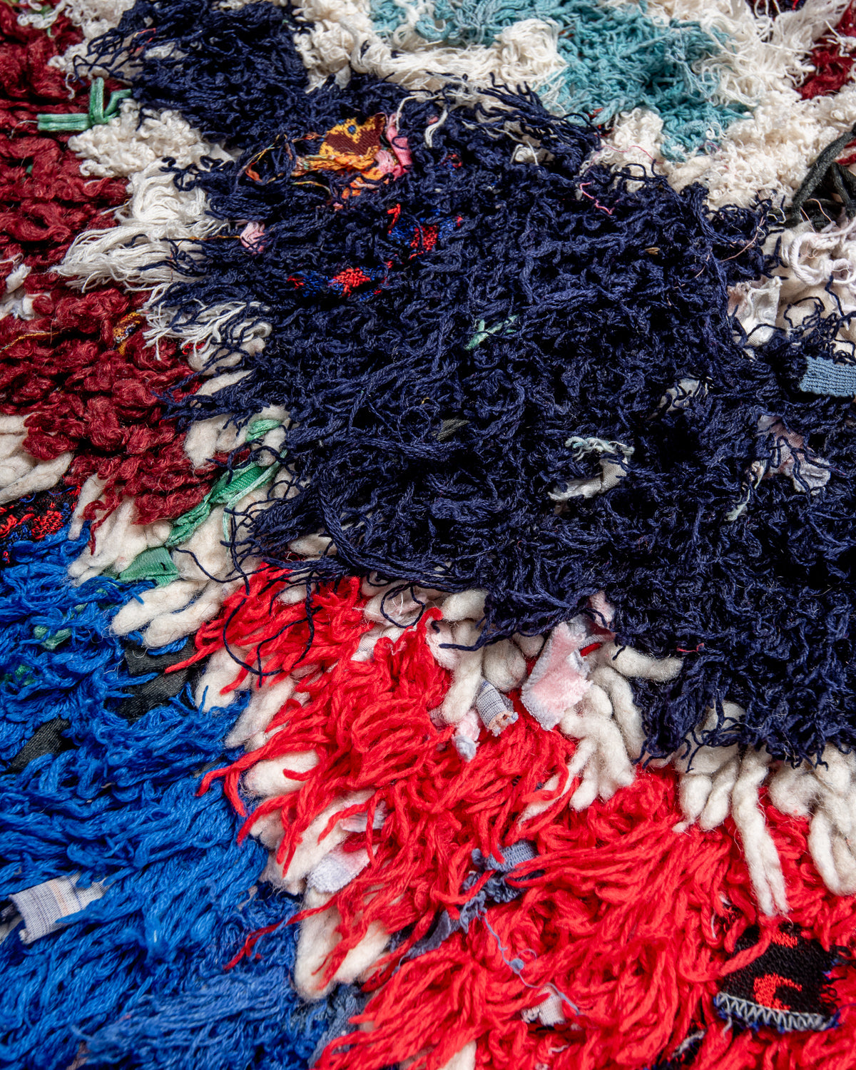 Modern designer vintage handcrafted Berber rug from Morocco. Boucherouite runner rug with beautiful colors and patterns.
